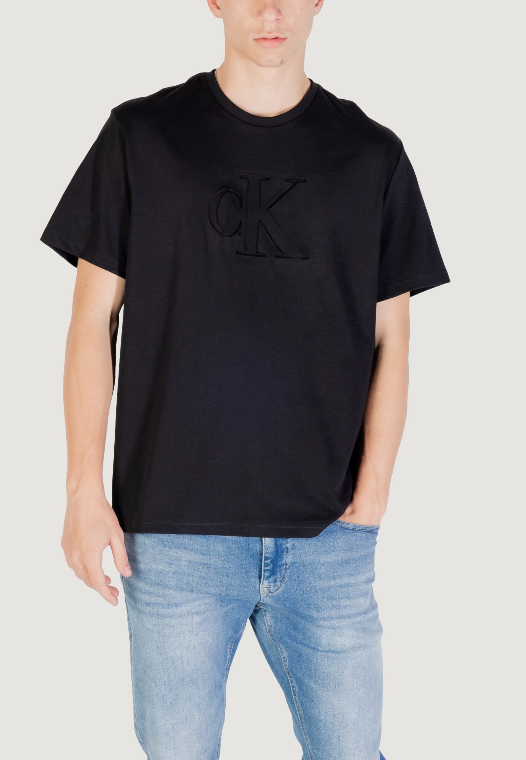 Calvin Klein Men's Black T-Shirt - Debossed Monogram Logo