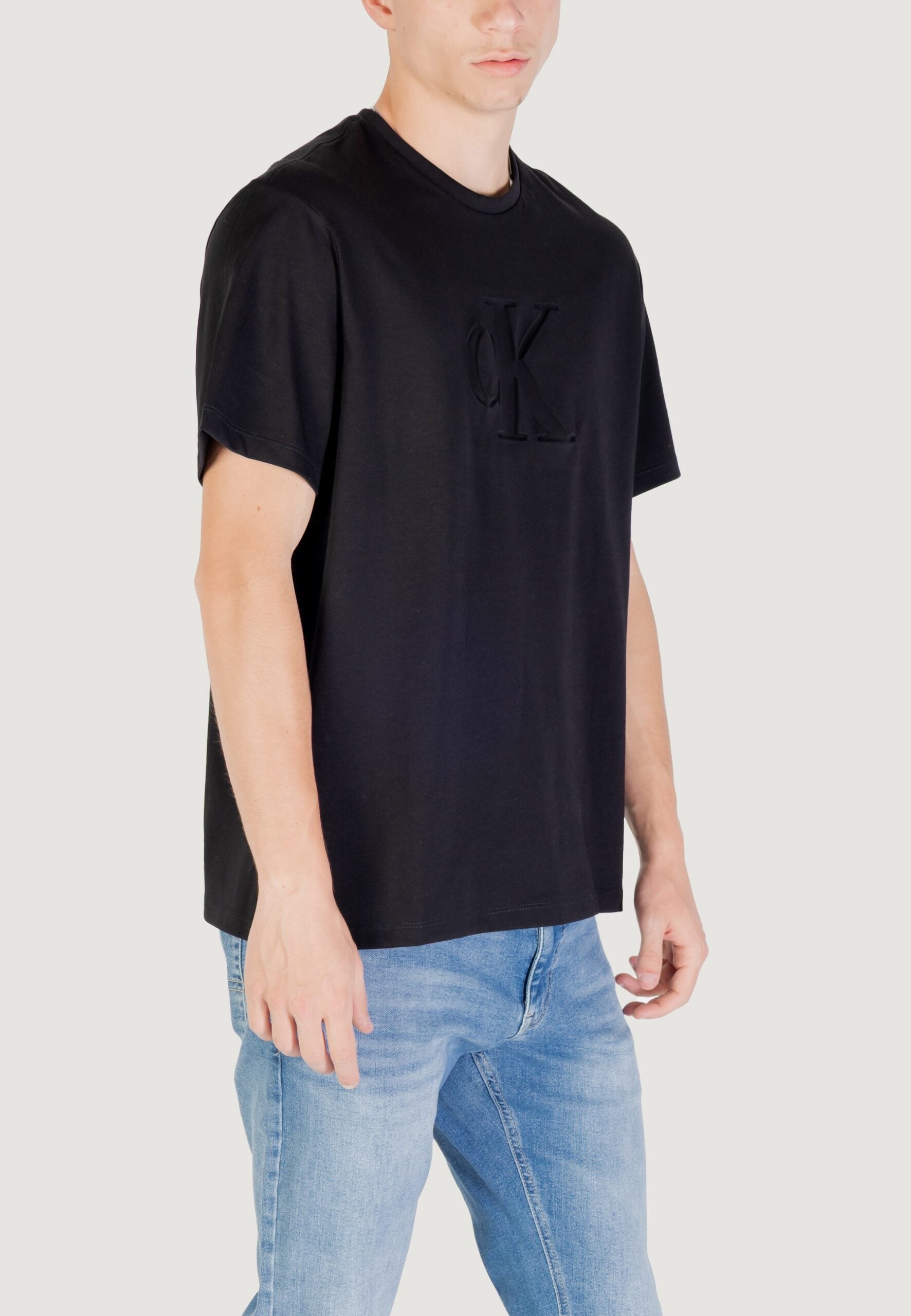 Calvin Klein Men's Black T-Shirt - Debossed Monogram Logo
