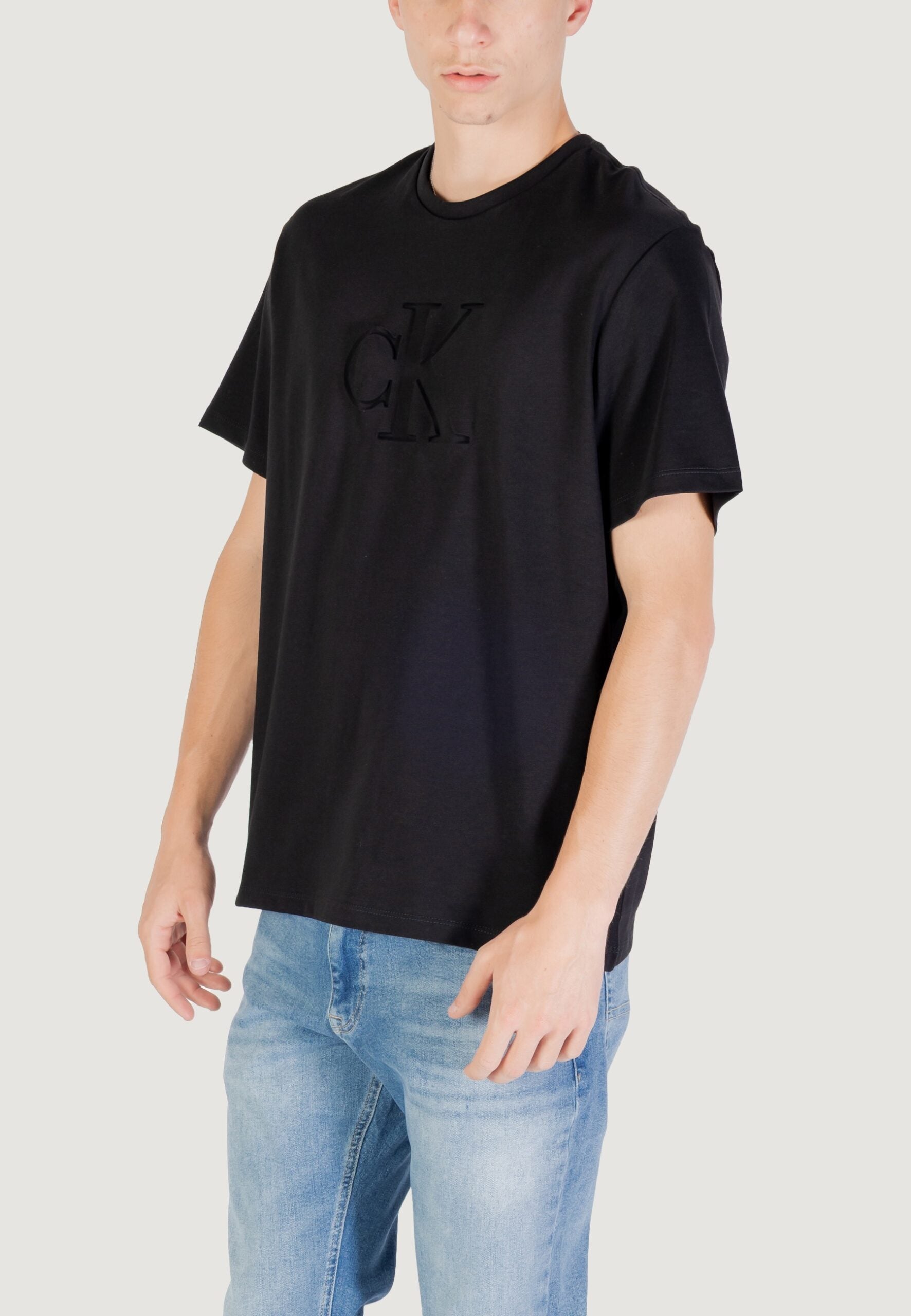Calvin Klein Men's Black T-Shirt - Debossed Monogram Logo