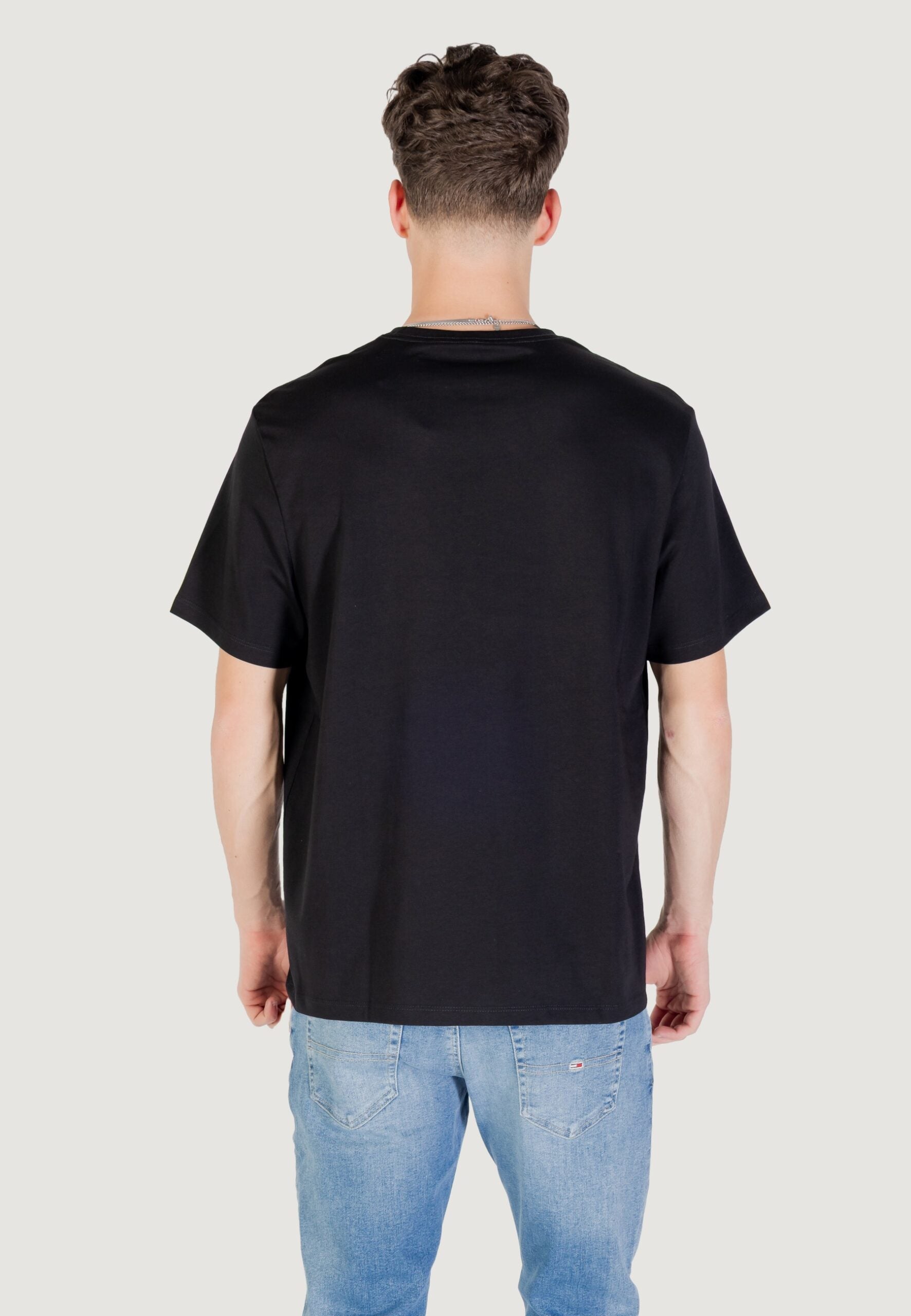 Calvin Klein Men's Black T-Shirt - Debossed Monogram Logo