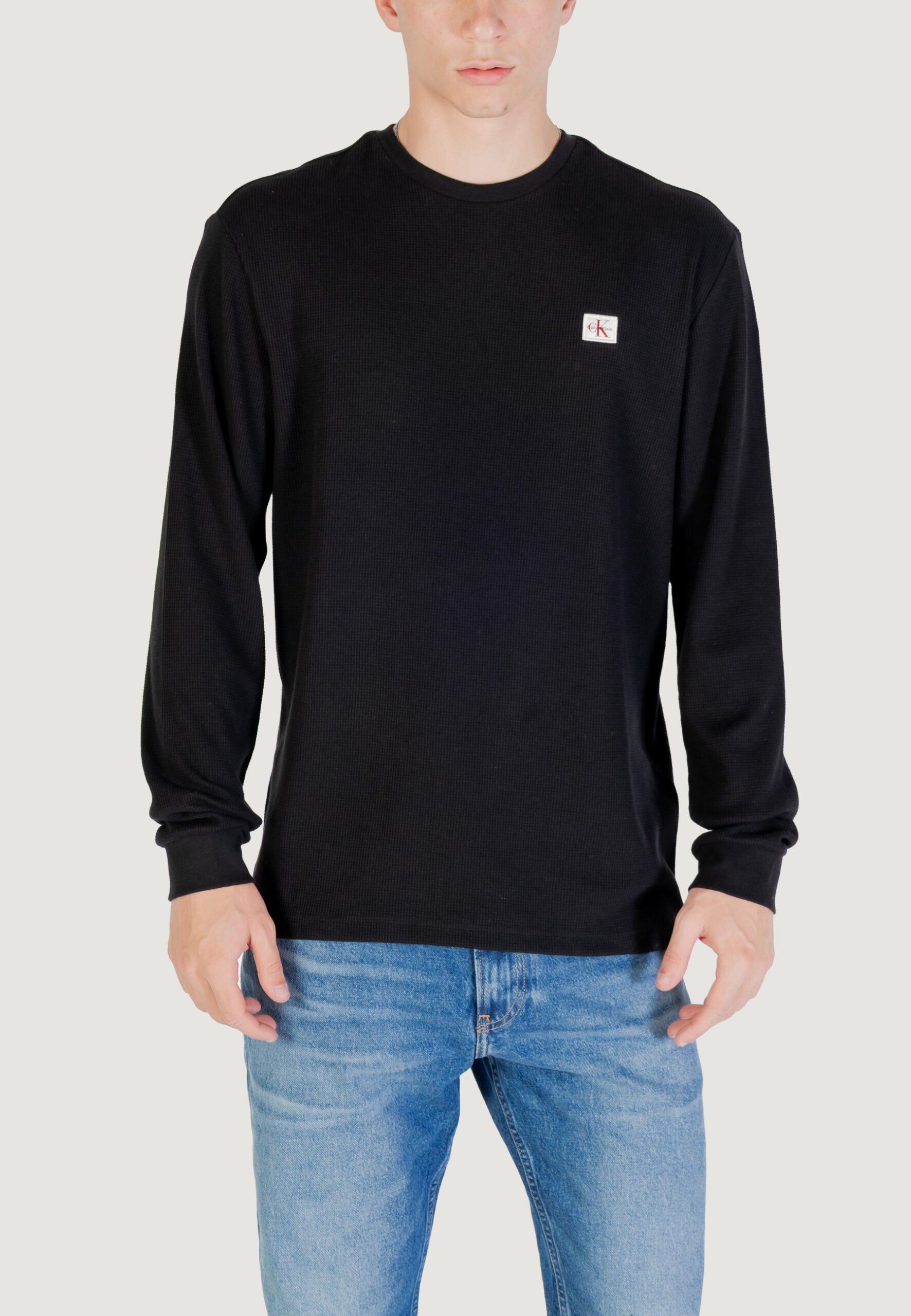 カルバン・クライン ジーンズ メンズ ブラック ワッフル ロングスリーブ Tシャツ - バッジロゴ クルーネック