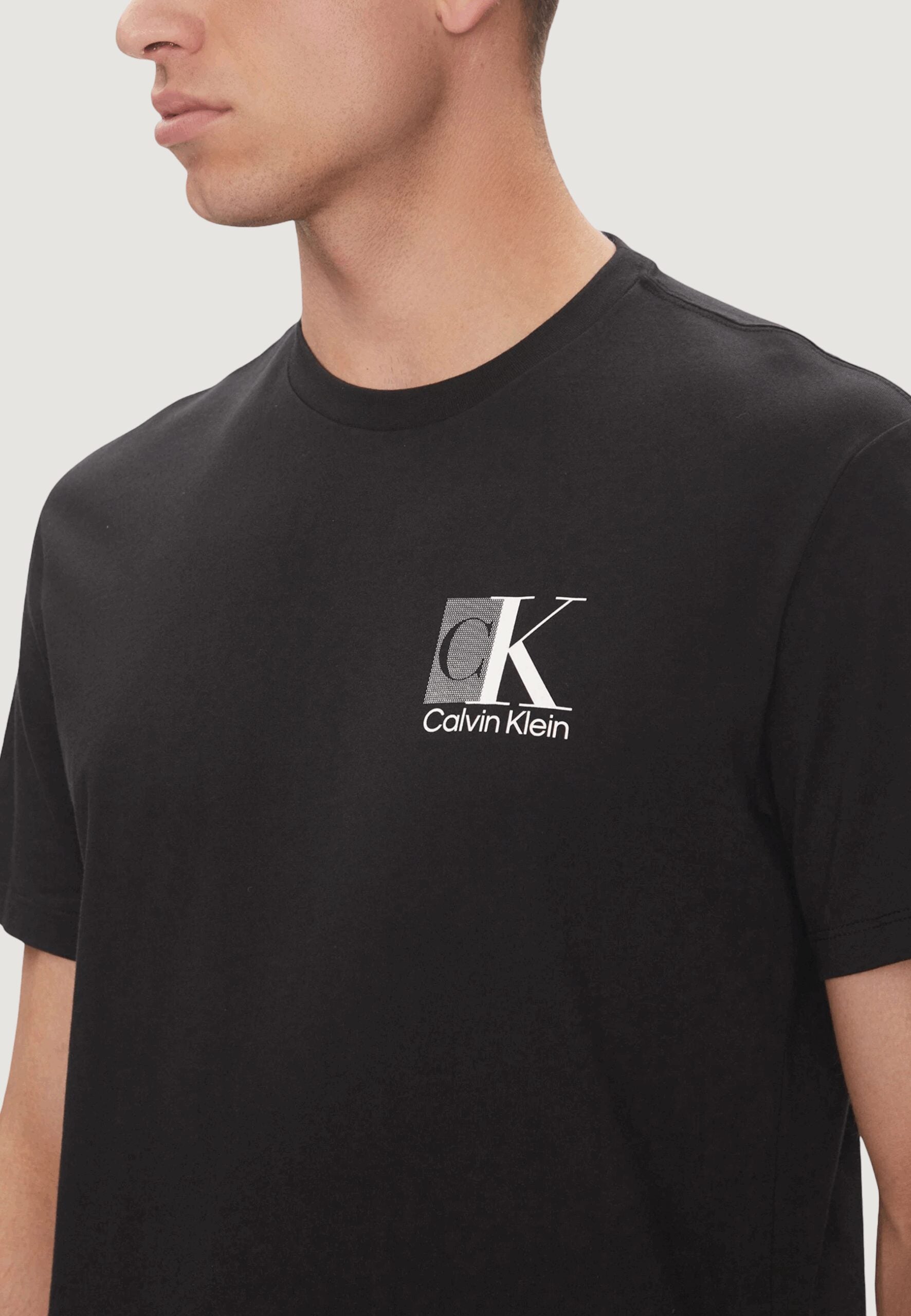 Calvin Klein Men's Black T-Shirt - Abstract Logo Print & Casual Style
