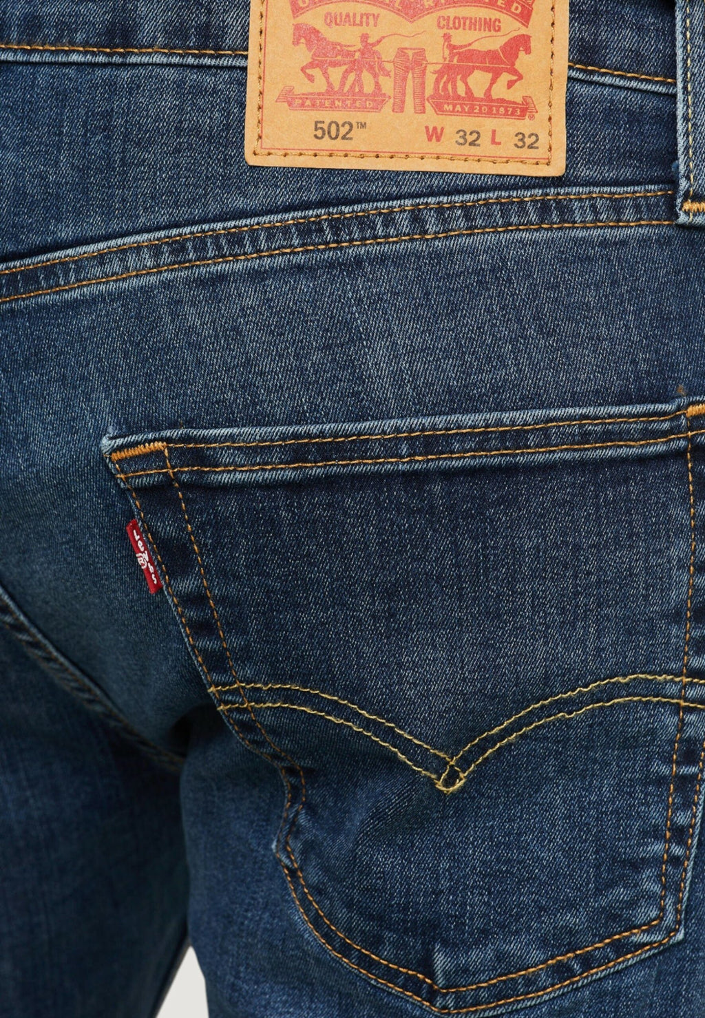 Levi's® メンズ ダークブルー デニム 502 テーパードジーンズ